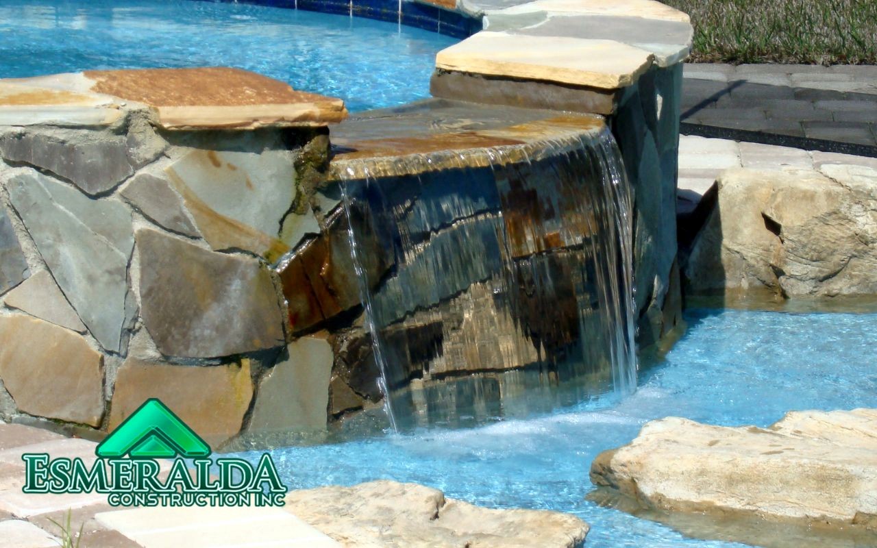 Add a natural touch to your property with an amazing waterfall pool